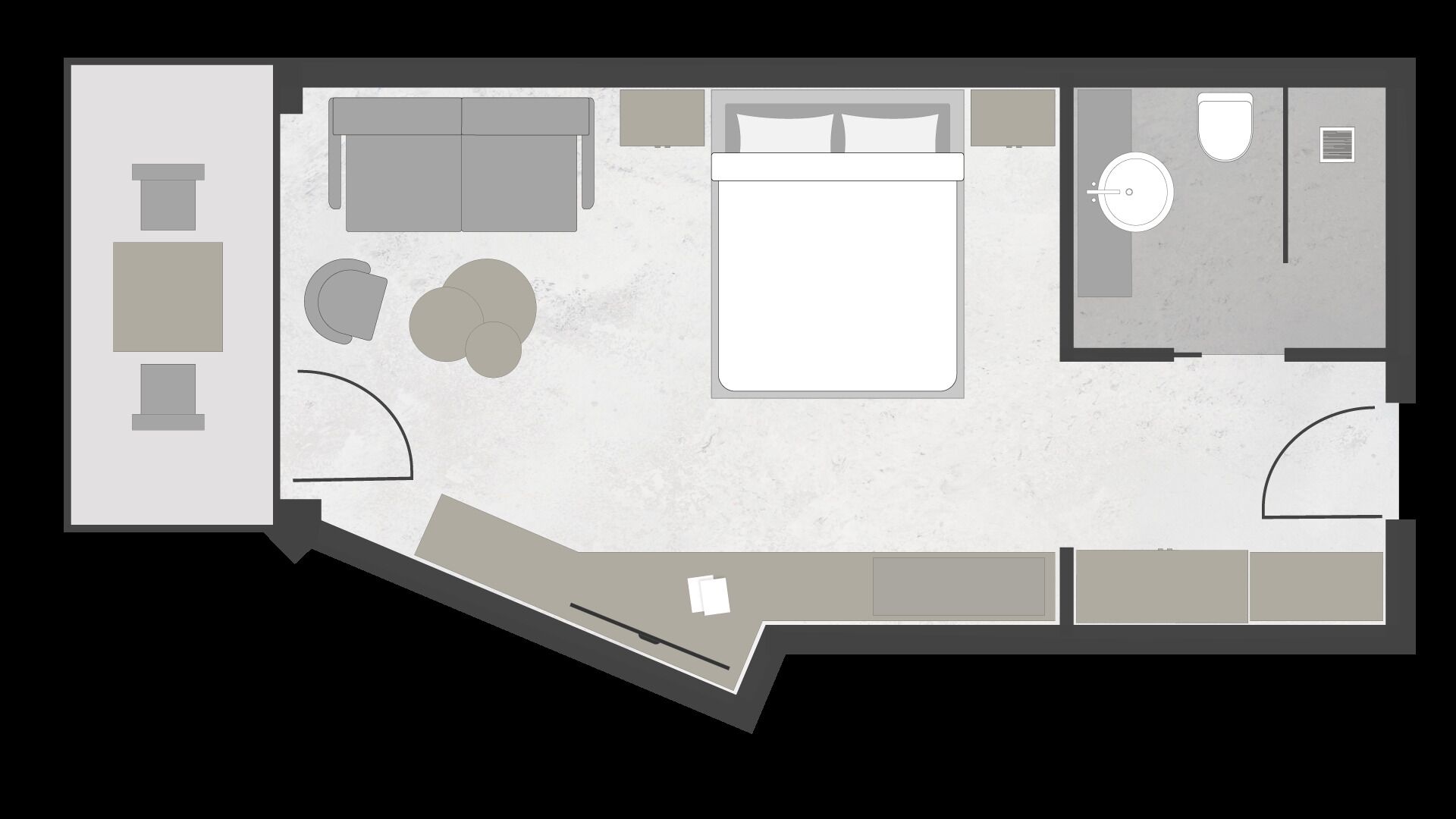 A floor plan of a hotel room with a bed, a desk, a chair, a small table, and a bathroom.
