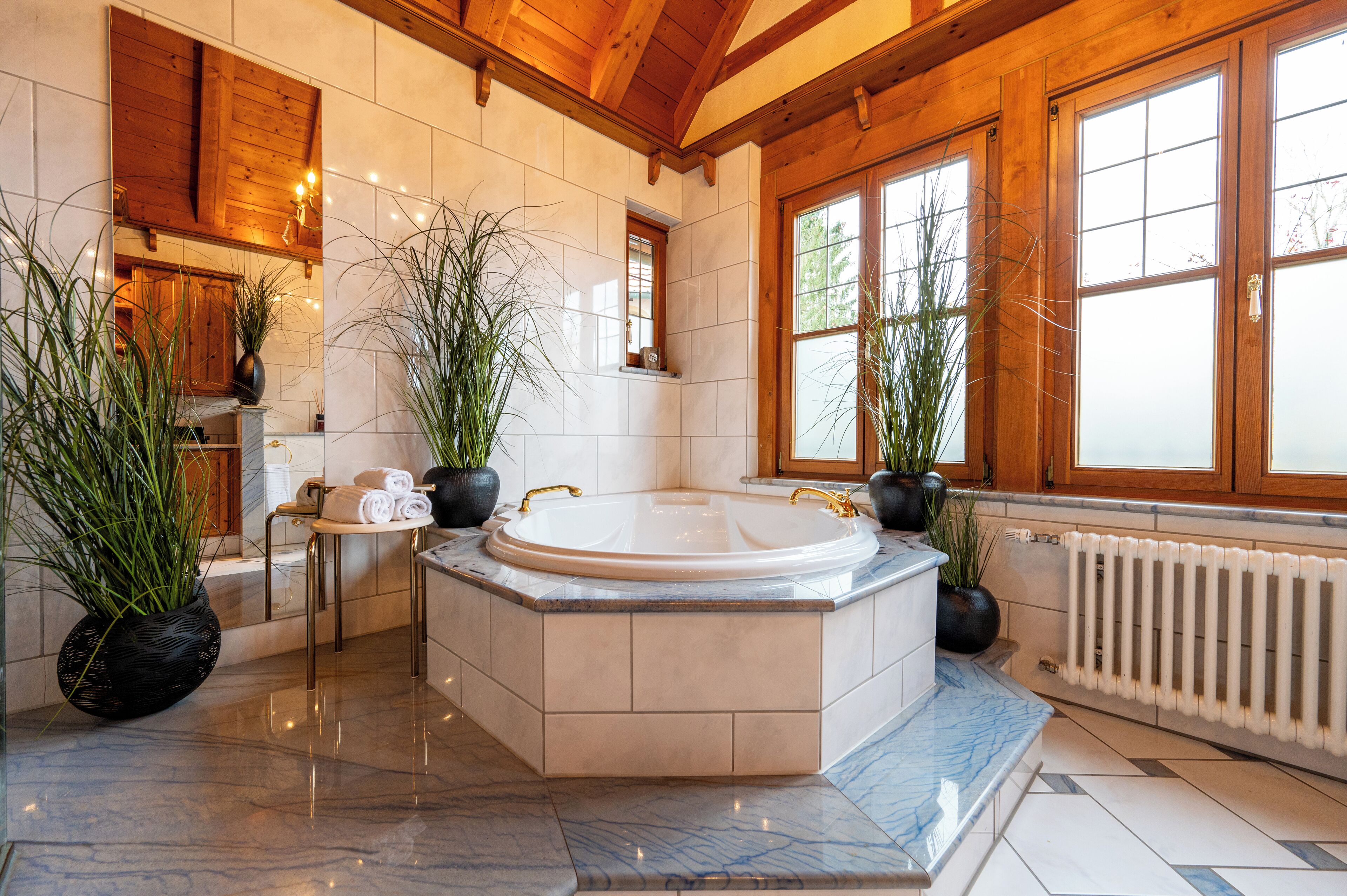 chalet kitzbuehel - grand lodge | bathroom | rainfall showerhead, free toiletries, hair dryer, bathrobes