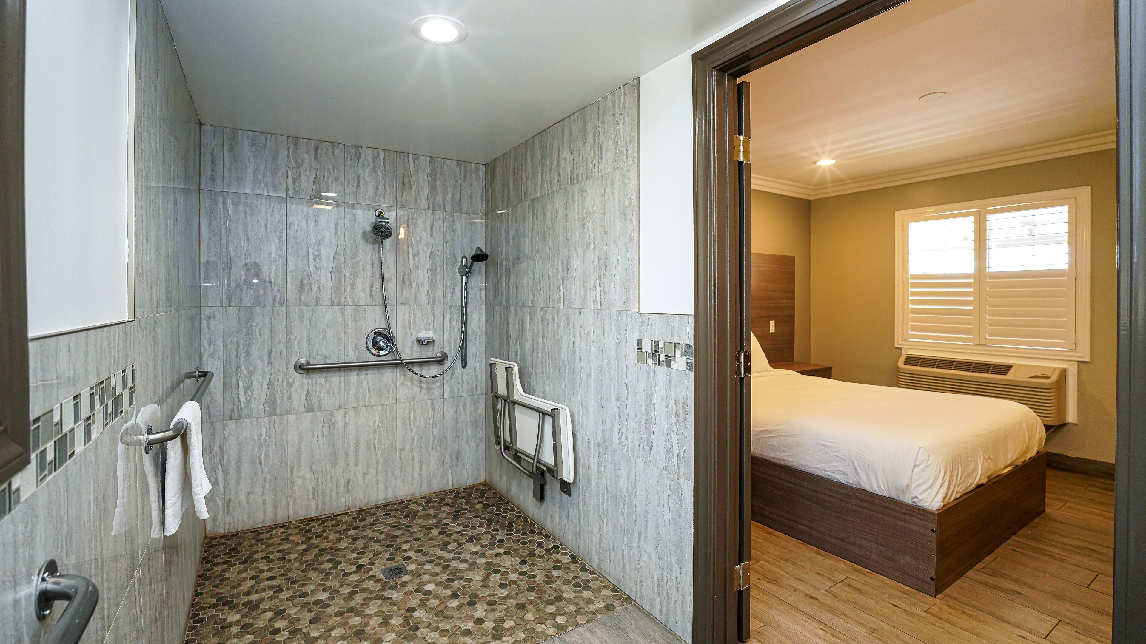 Rainfall showerhead, free toiletries, hair dryer, towels