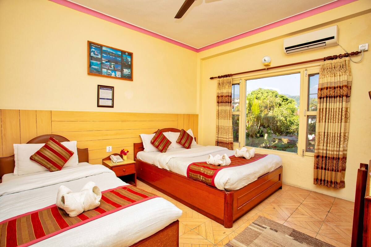 Family Triple Room, Mountain View | Premium bedding, memory foam beds, in-room safe, desk