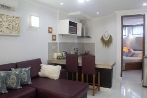Apartment, 1 Bedroom | Living area | TV, DVD player - Bali Palms Resort (Manggis)