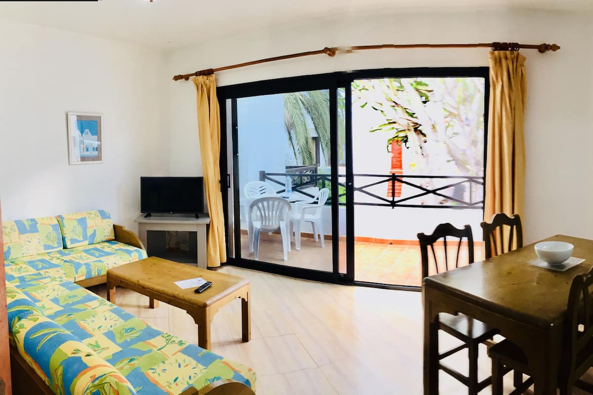 Apartment, 2 Bedrooms | Living area | 32-inch LED TV with satellite channels, TV