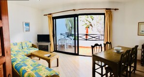 Apartment, 2 Bedrooms | Living area | 32-inch LED TV with satellite channels, TV