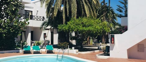 Outdoor pool, open 9:30 AM to 8:00 PM, pool umbrellas, sun loungers