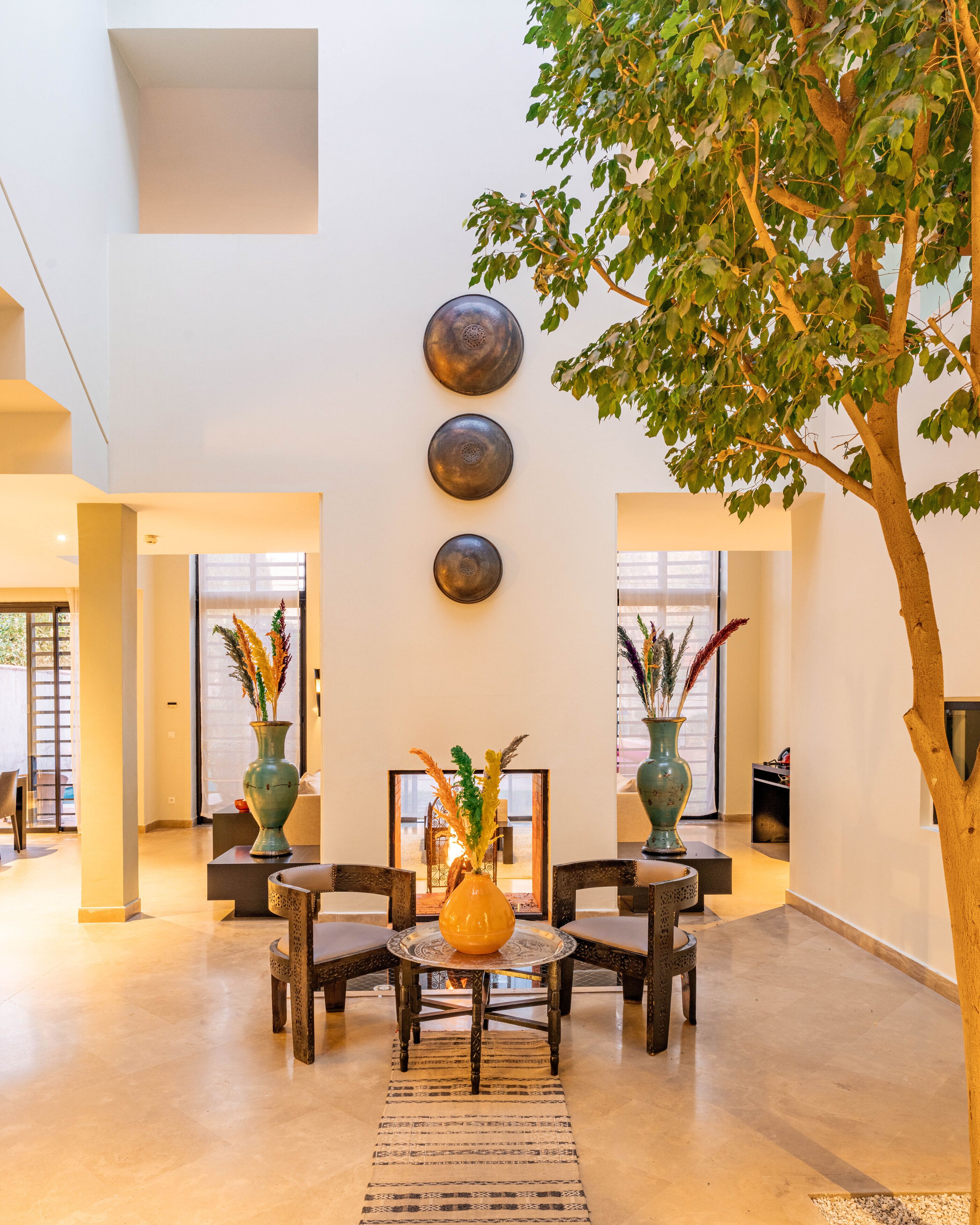 deluxe villa, 4 bedrooms | living area | 40-inch lcd tv with satellite channels, fireplace