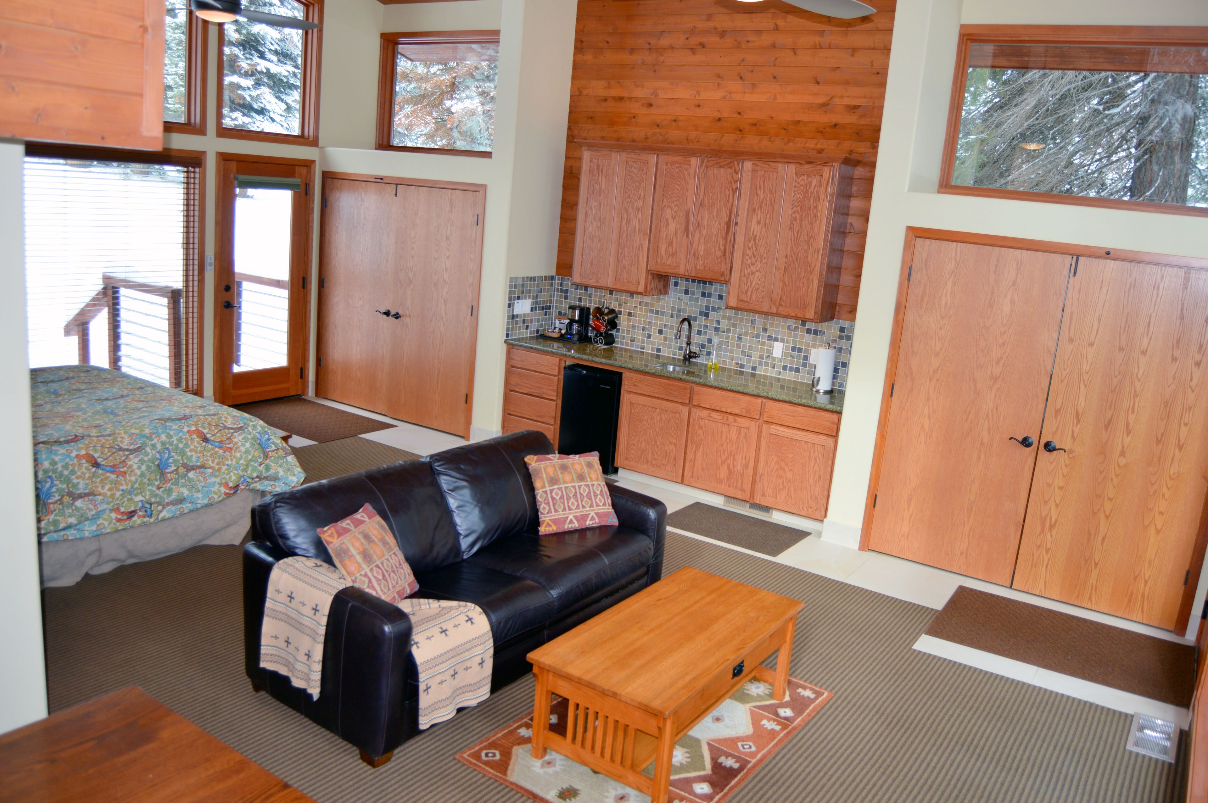 forest cabin, king bed and bunk bed | living area