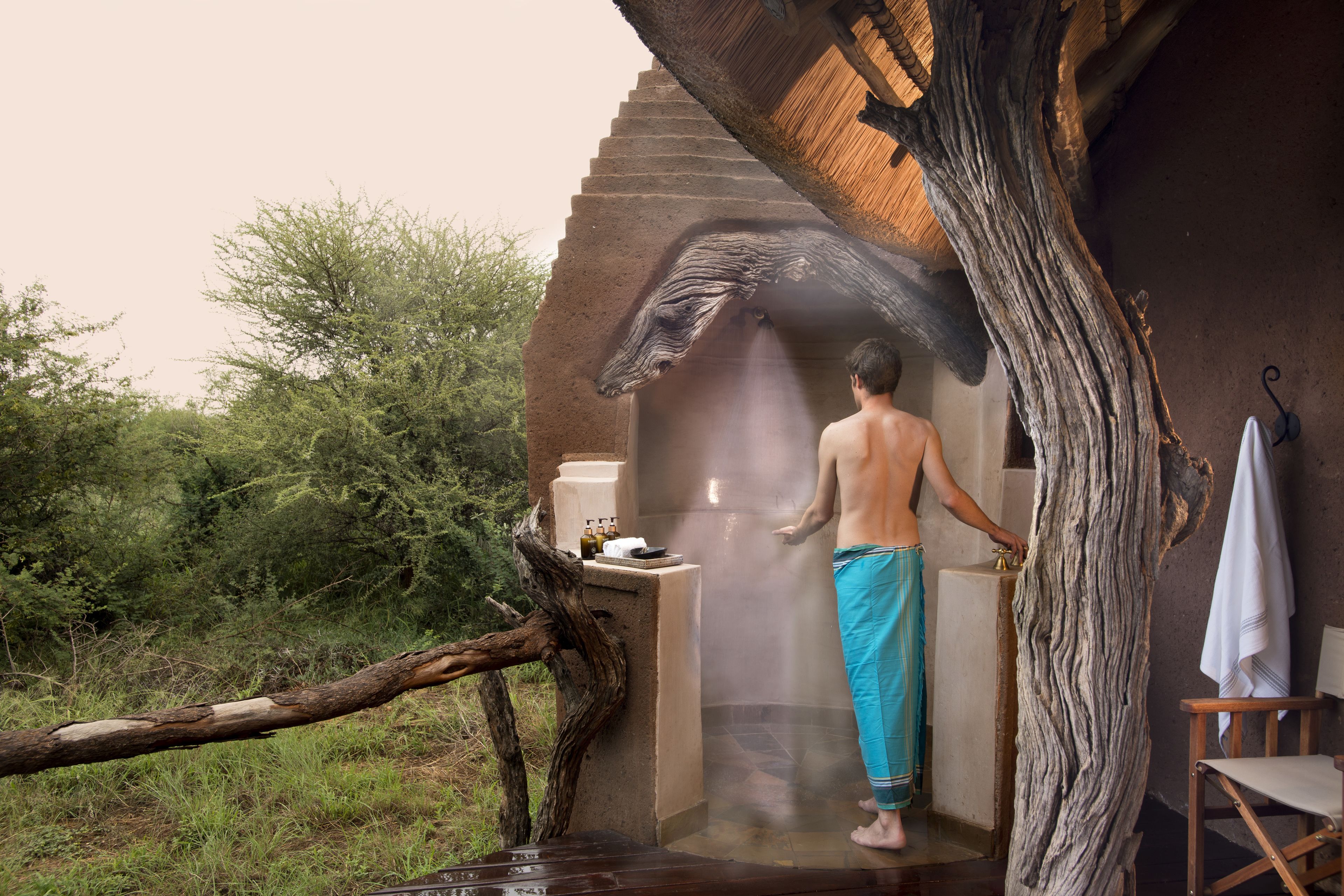 Lelapa Suite | Bathroom amenities | Separate tub and shower, rainfall showerhead, designer toiletries
