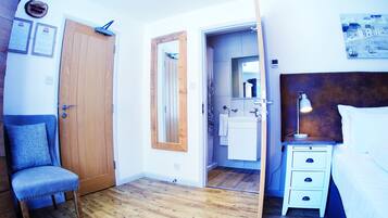 Room 4 (Not Dog Friendly Room) | Bathroom | Shower, hair dryer, towels