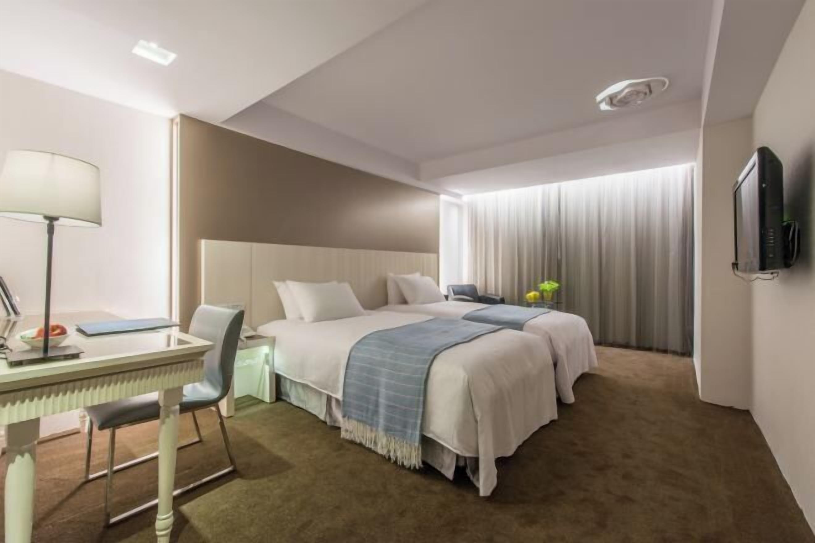 Pillowtop-bedden, een kluis op de kamer, individueel gedecoreerd