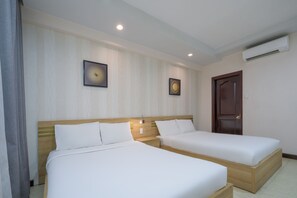 Standard Room, 2 Single Beds | Minibar, in-room safe, desk, laptop workspace - NNT Plus Astro Hotel (Nha Trang)