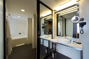 Shower, rainfall showerhead, designer toiletries, hair dryer