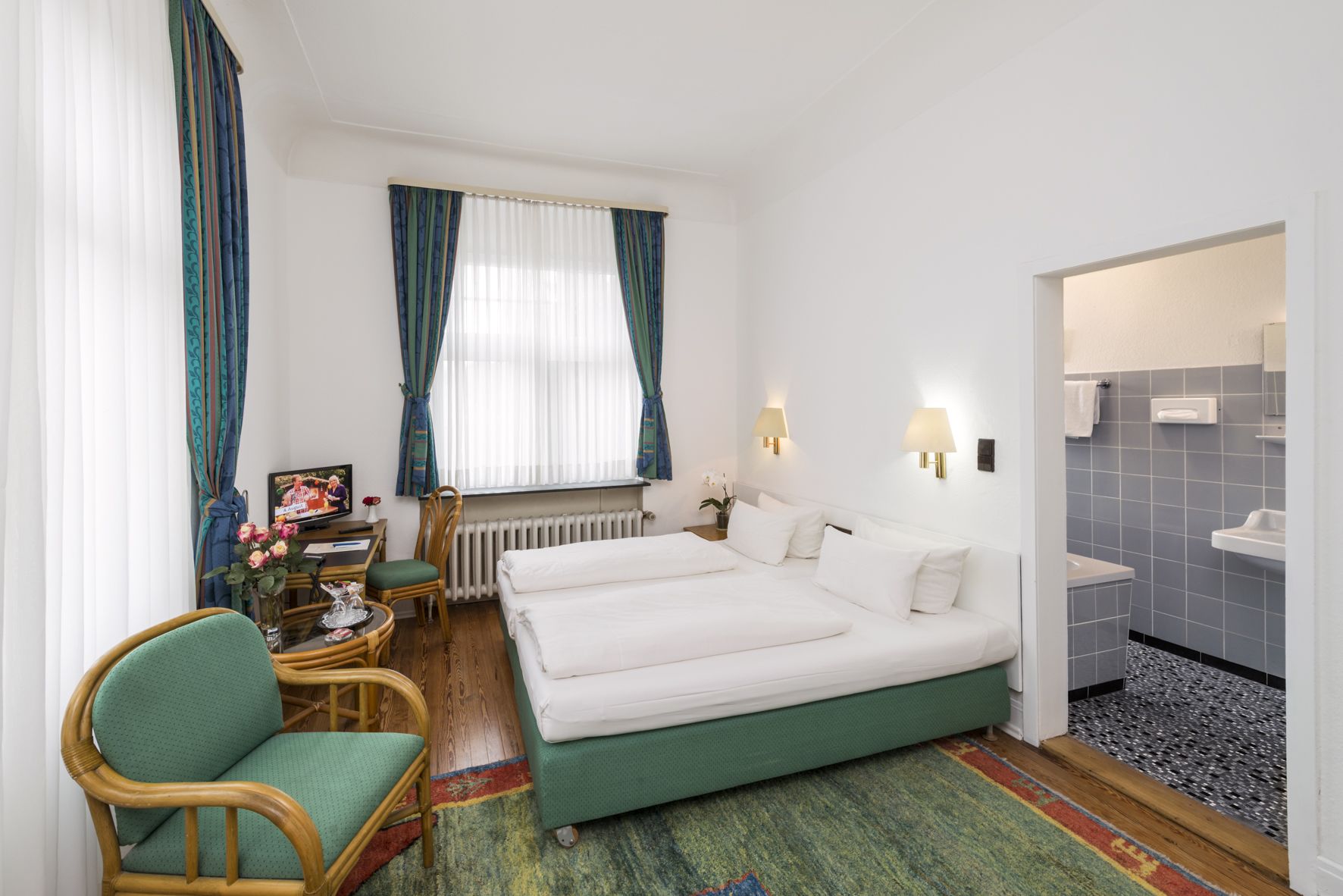 business double room | minibar, desk, blackout curtains, iron/ironing board