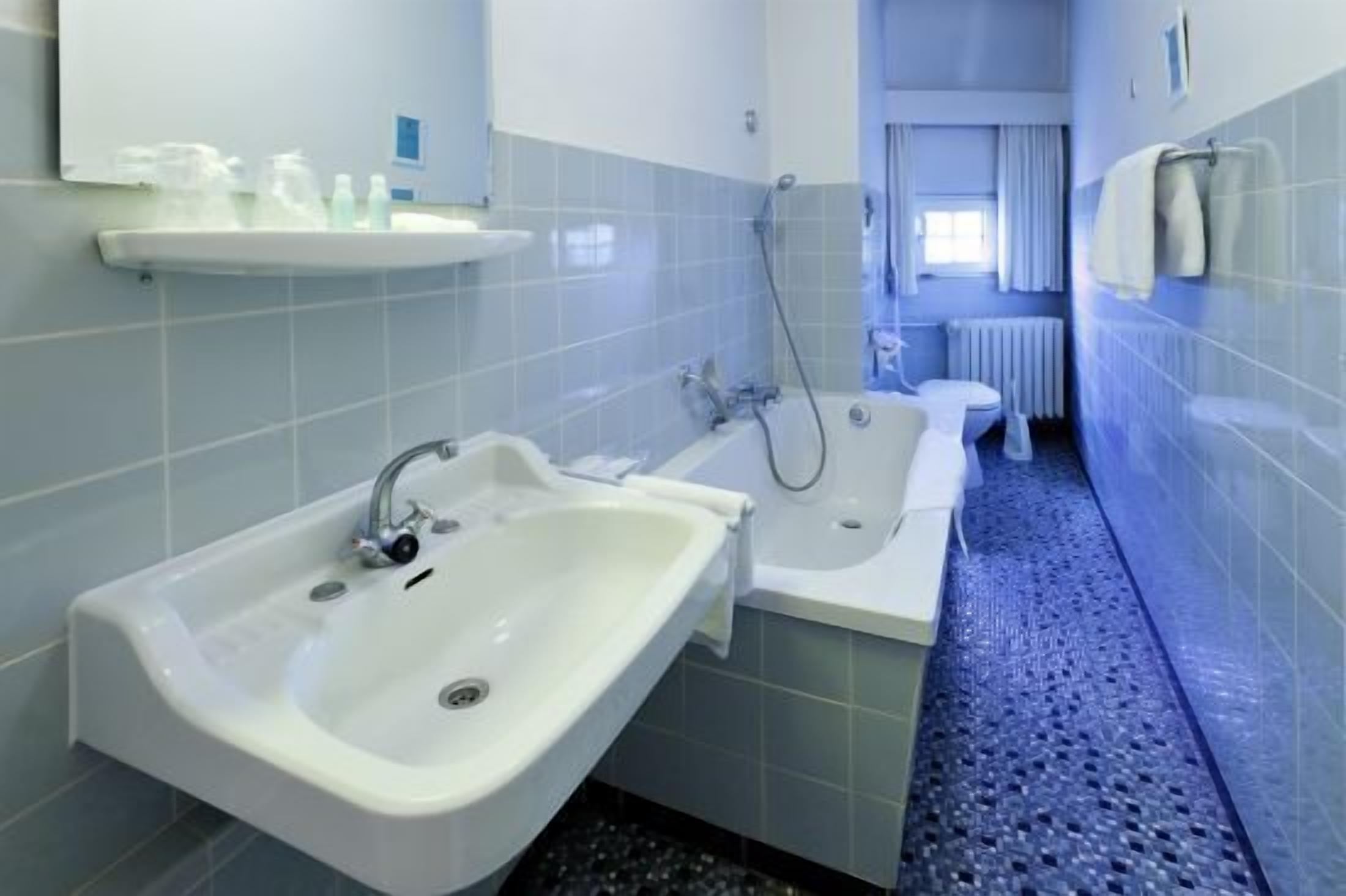 standard double room | bathroom | hair dryer, towels