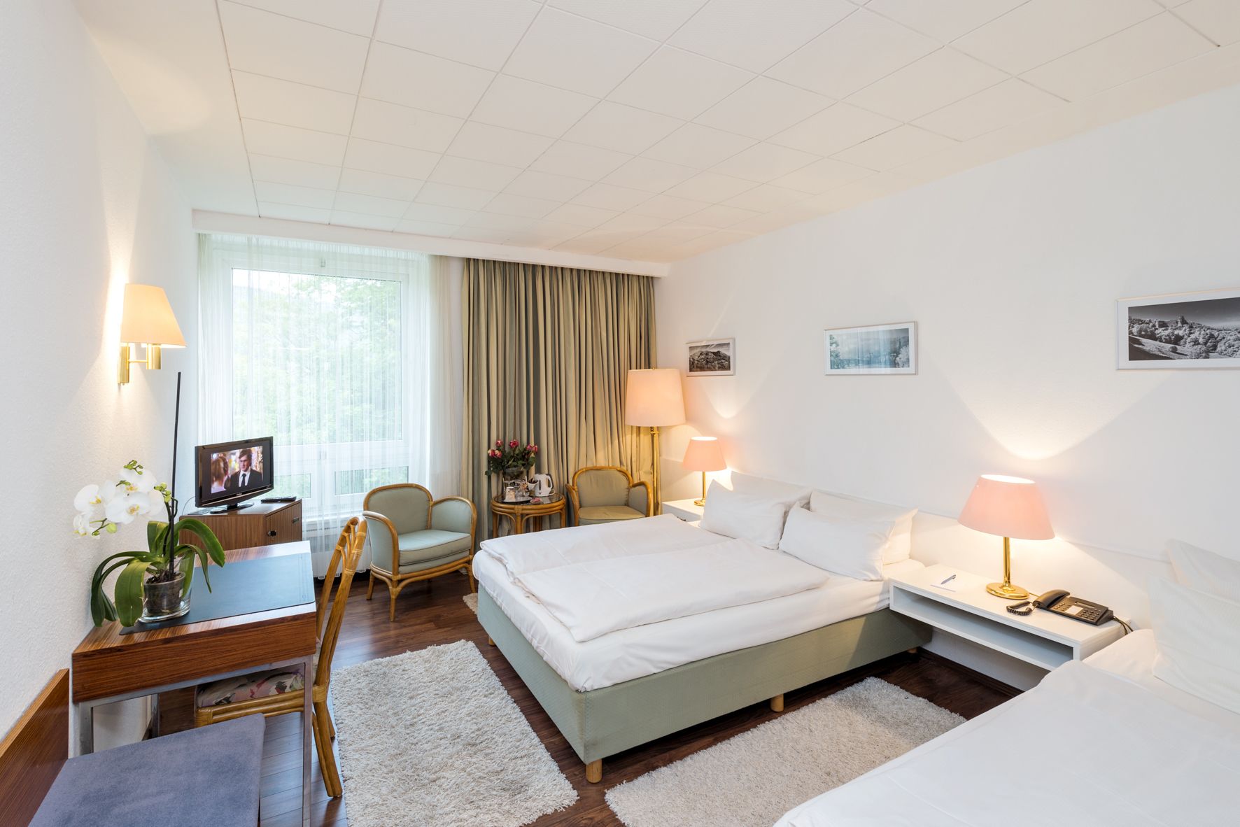 triple room | minibar, desk, blackout curtains, iron/ironing board