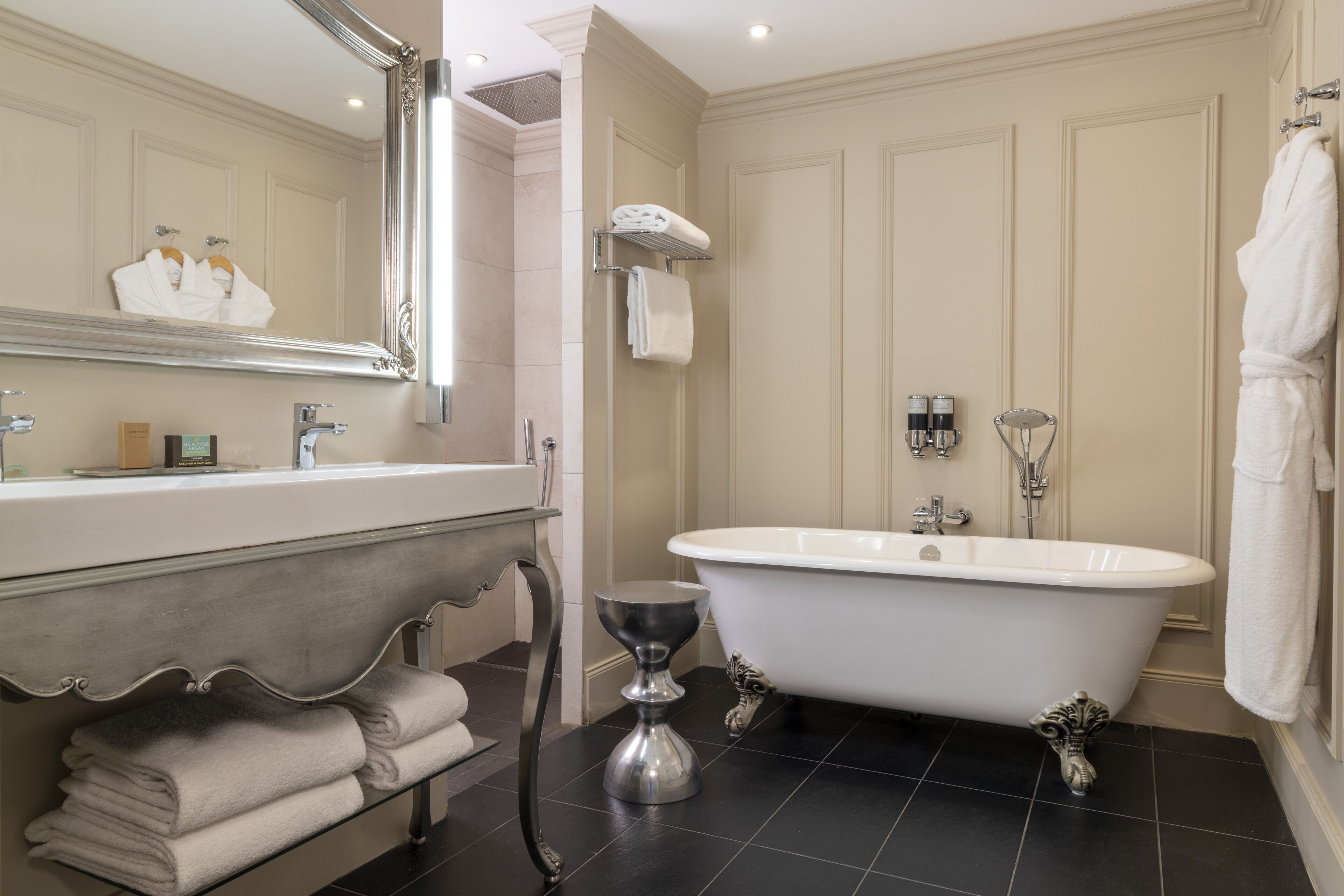 designer toiletries, hair dryer, bathrobes, slippers