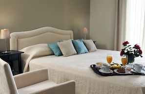 Egyptian cotton sheets, premium bedding, down duvets, minibar