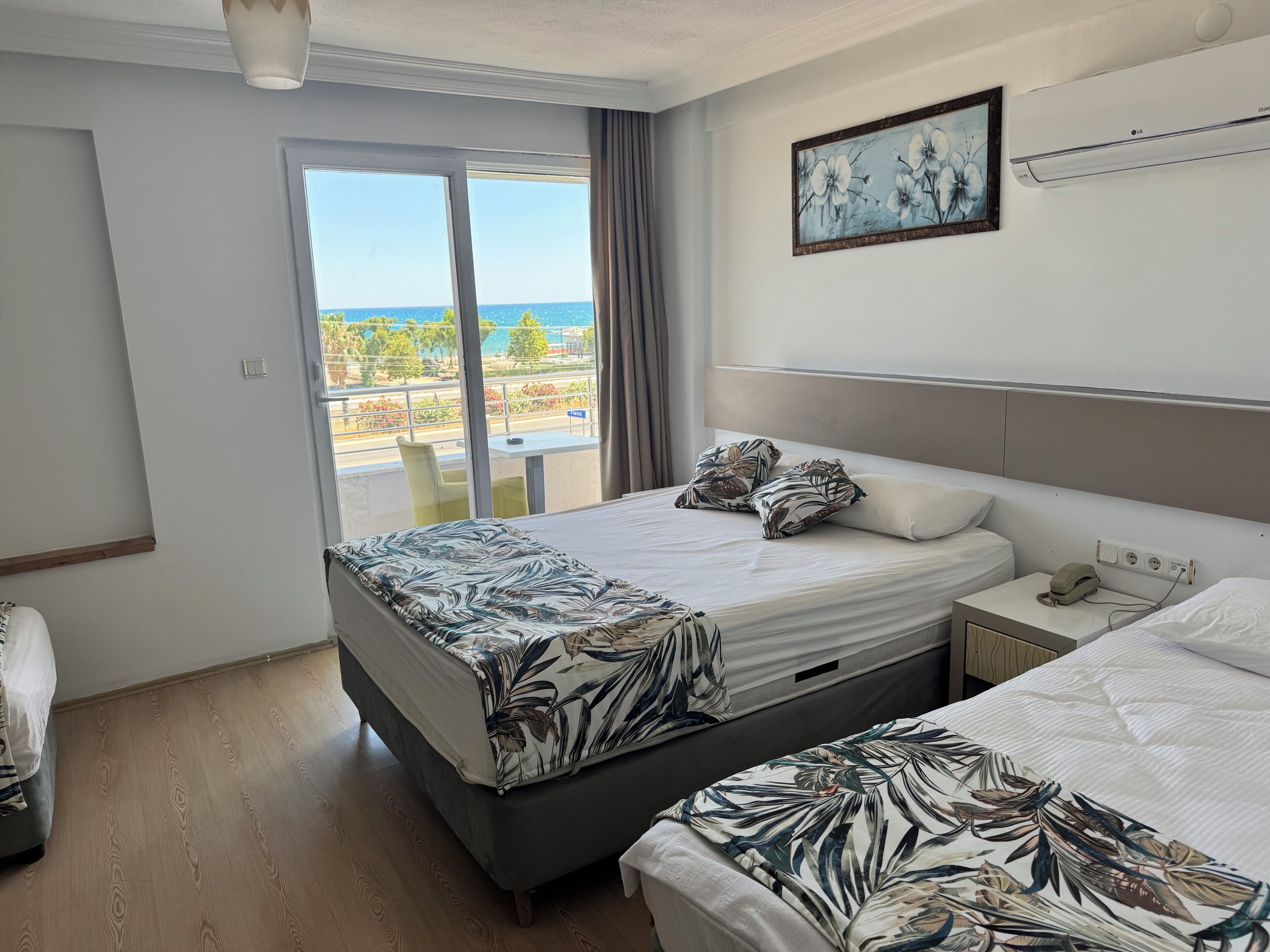 Superior Triple Room | In-room safe, desk, blackout drapes, iron/ironing board