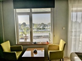 Superior Triple Room | In-room safe, desk, blackout drapes, iron/ironing board