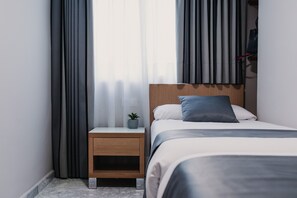 Appartamento, 1 camera da letto (Twin beds) | 1 camera, una cassaforte in camera, ferro/asse da stiro, Wi-Fi gratuito