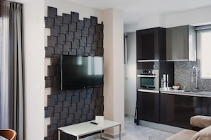 Attico Superior, 1 camera da letto, terrazzo | Area soggiorno | TV a schermo piatto