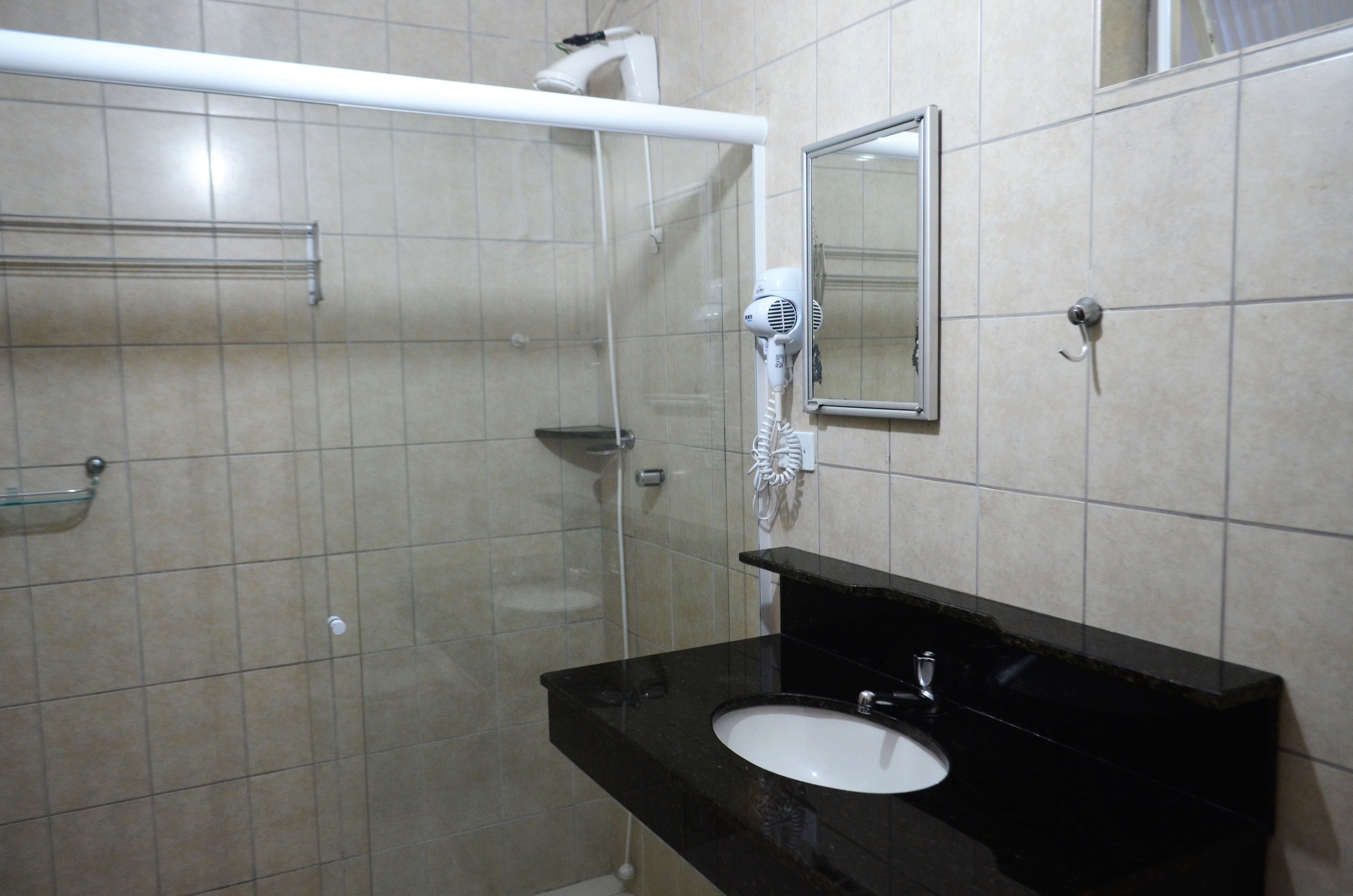 superior quadruple room | bathroom | shower, free toiletries, hair dryer, towels