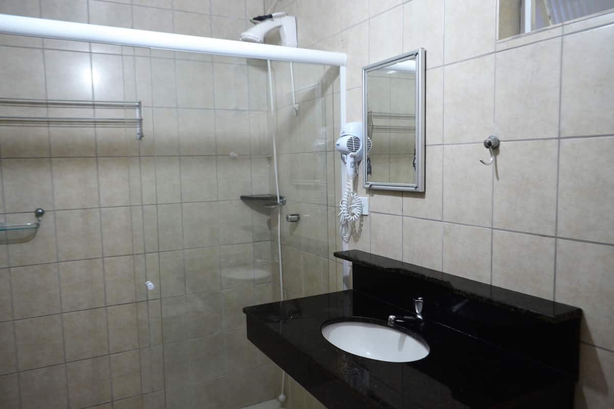 superior quadruple room | bathroom | shower, free toiletries, hair dryer, towels