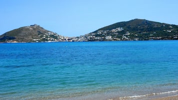 On the beach, sun-loungers, beach towels