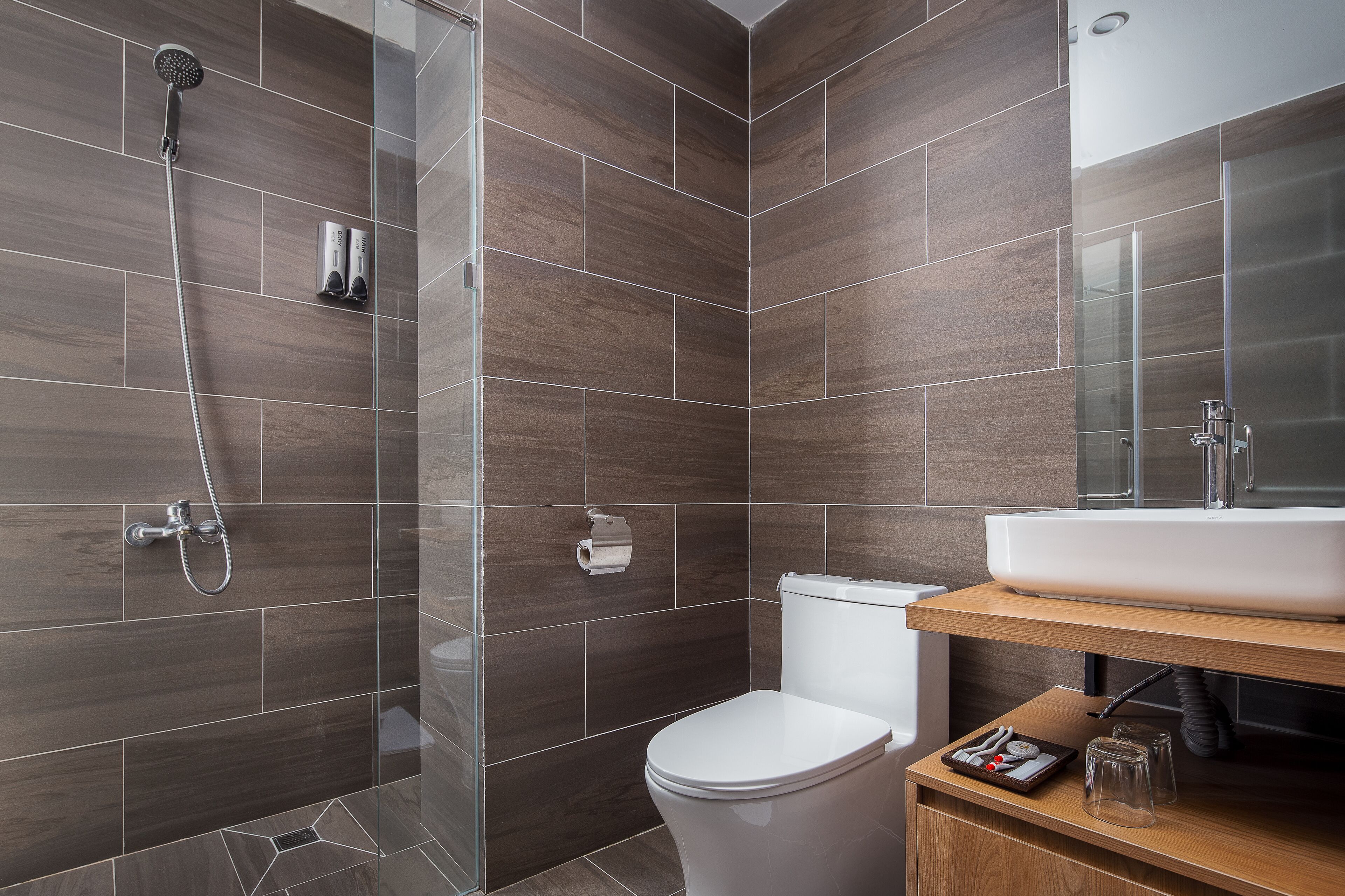 family room | bathroom | shower, rainfall showerhead, free toiletries, hair dryer