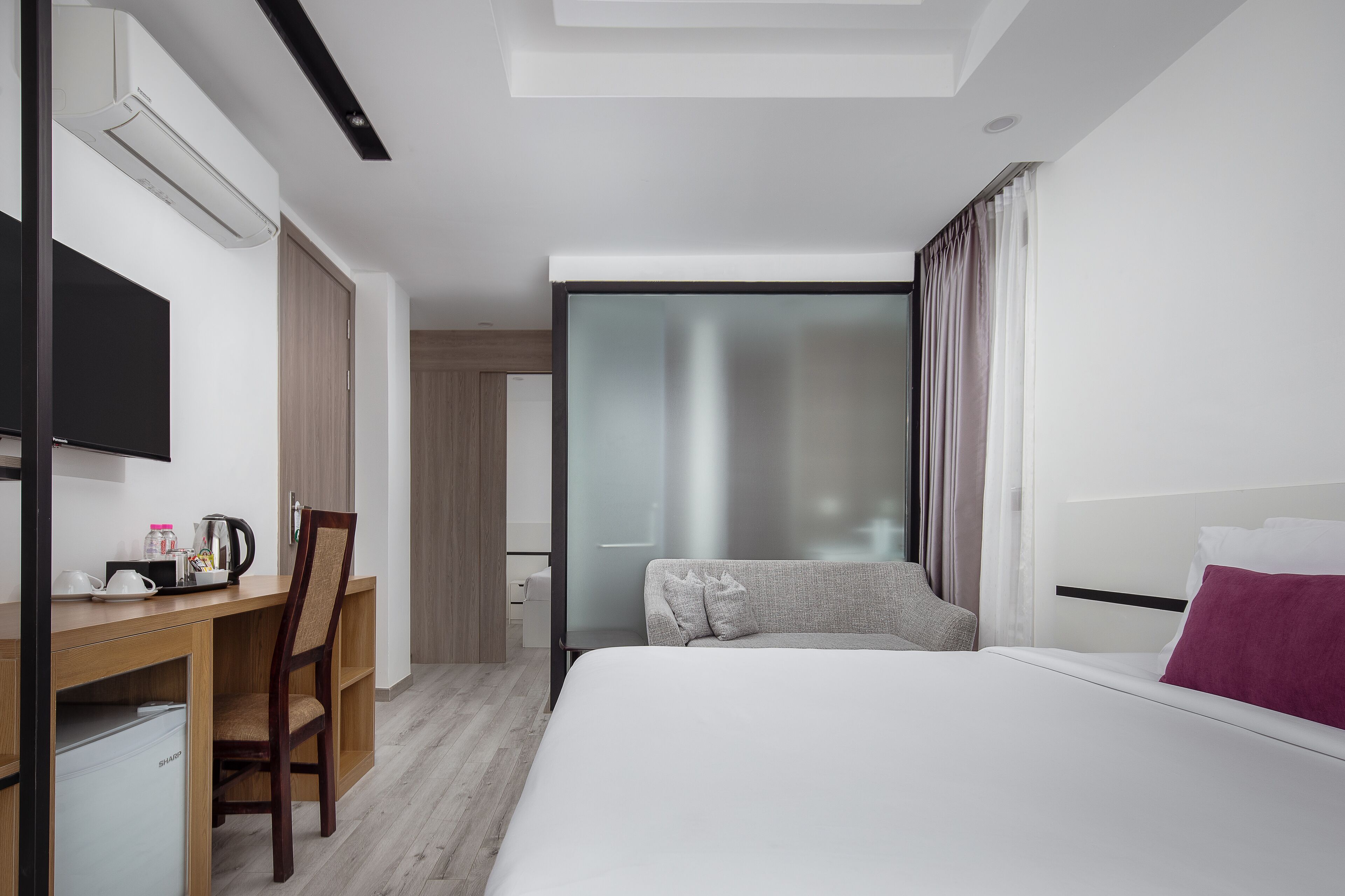 family room | 1 bedroom, premium bedding, select comfort beds, minibar