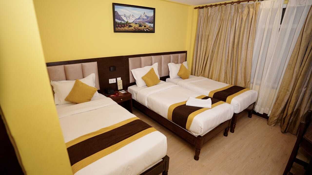 Deluxe Triple Room | Hypo-allergenic bedding, down comforters, Select Comfort beds, minibar