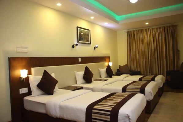 Deluxe Triple Room | Pillowtop beds, individually decorated, desk, blackout drapes - Backyard Hotel (Kathmandu)