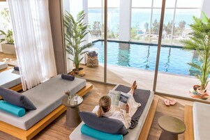 Indoor pool, seasonal outdoor pool, pool umbrellas, sun loungers