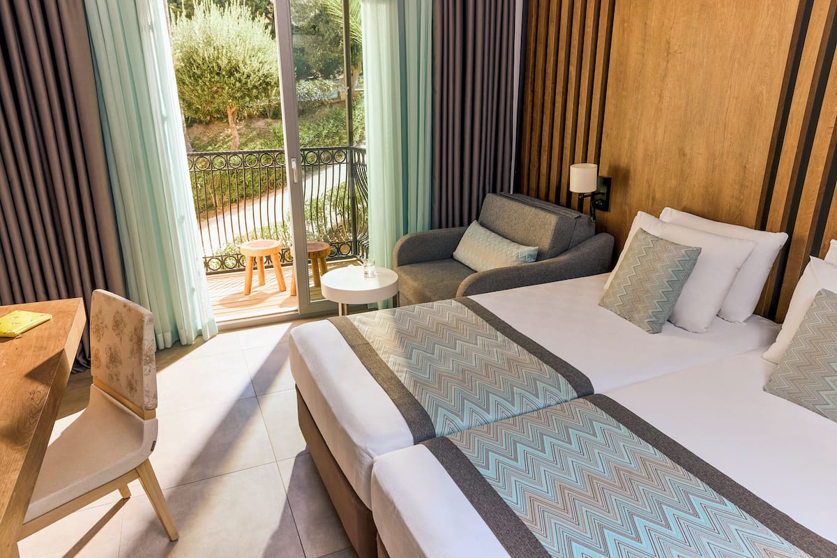 Habitación estándar (Main Building) | Ropa de cama de alta calidad y artículos del minibar gratis