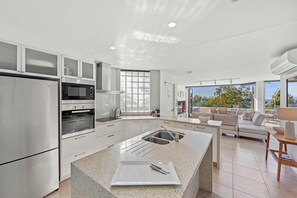 Two Bedroom Apartment 9 | Private kitchen | Full-size fridge, microwave, oven, stovetop - Picture Point Terraces (Noosa Heads)