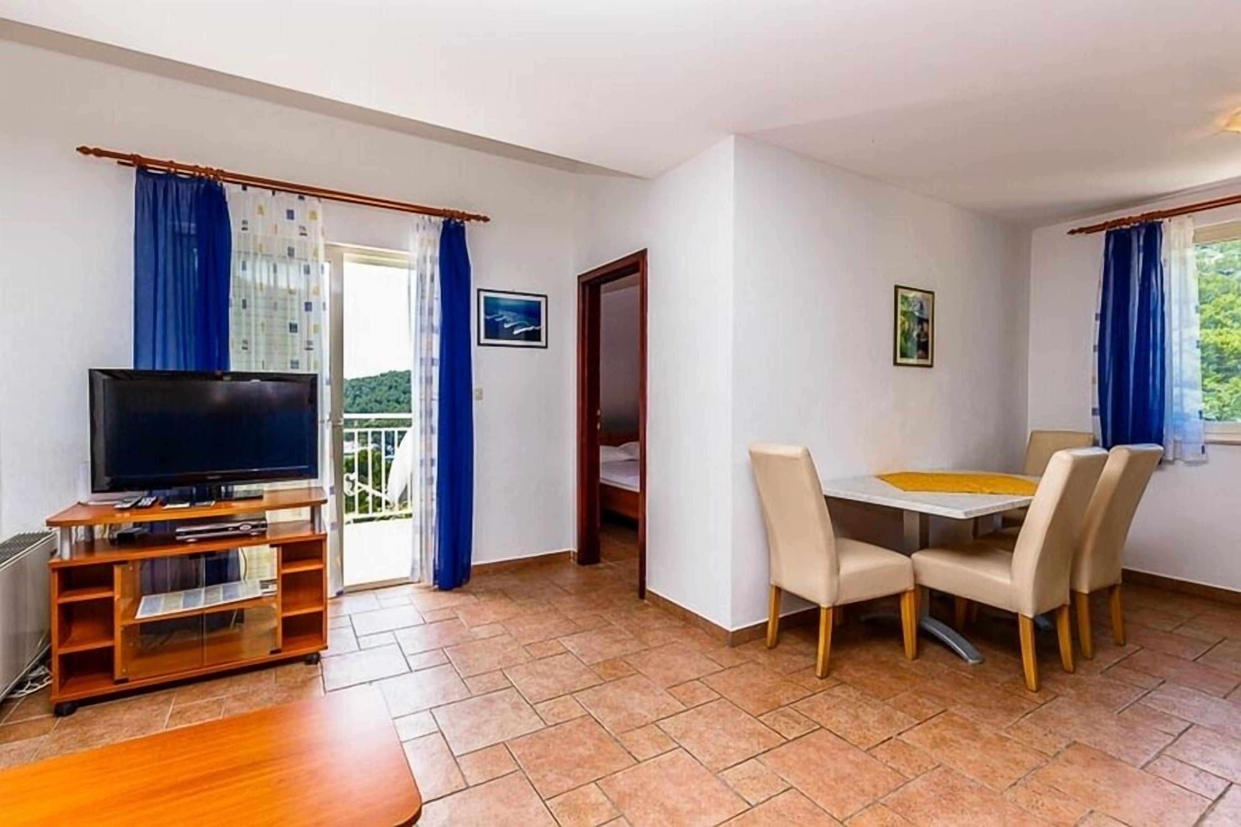 Apartment, 2 Bedrooms | Living area | LCD TV