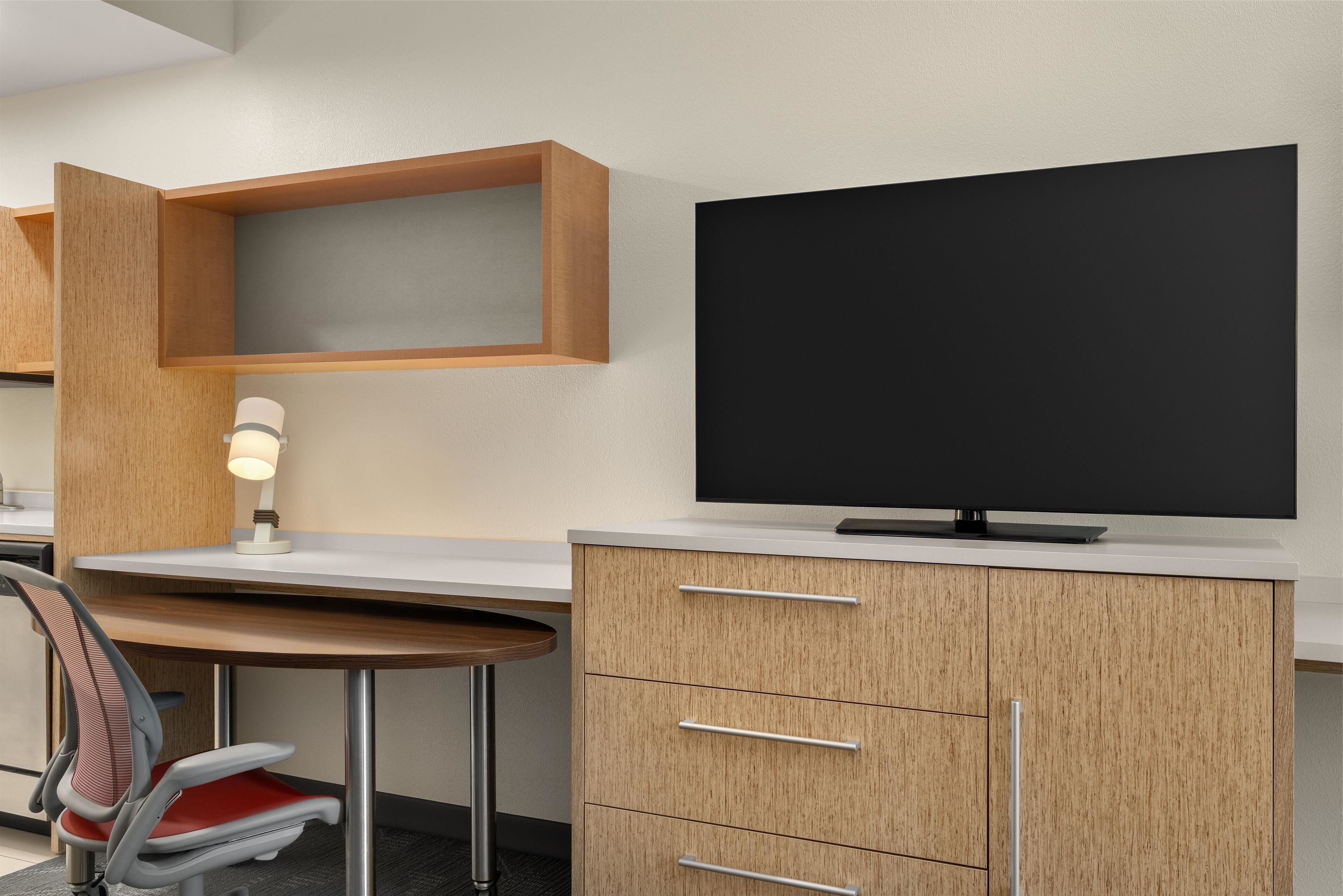 full-sized fridge, microwave, stovetop, dishwasher