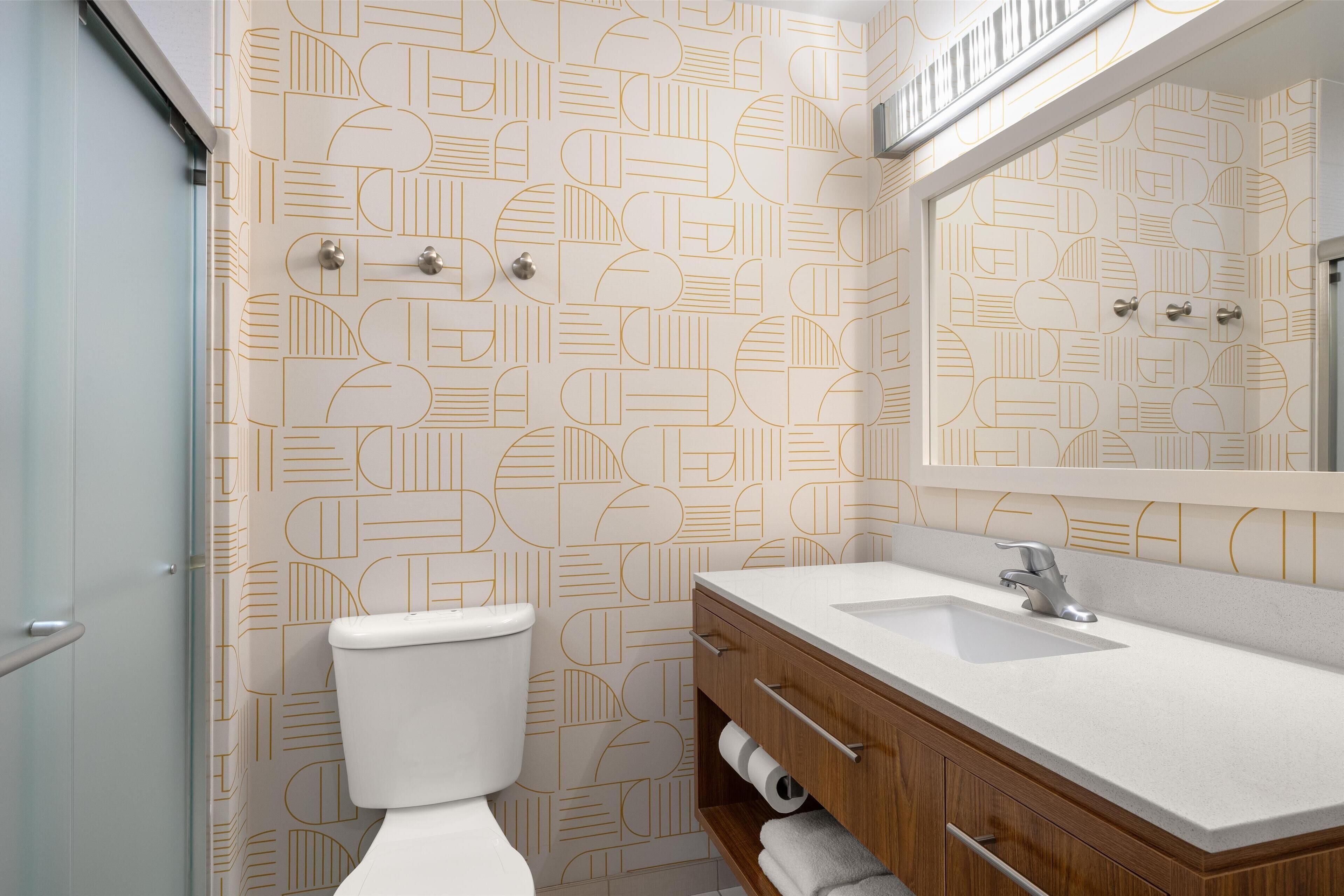 eco-friendly toiletries, hair dryer, towels