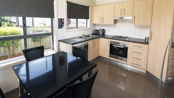 Executive Apartment, 2 Bedrooms | Private kitchen | Fridge, microwave, stovetop, dishwasher