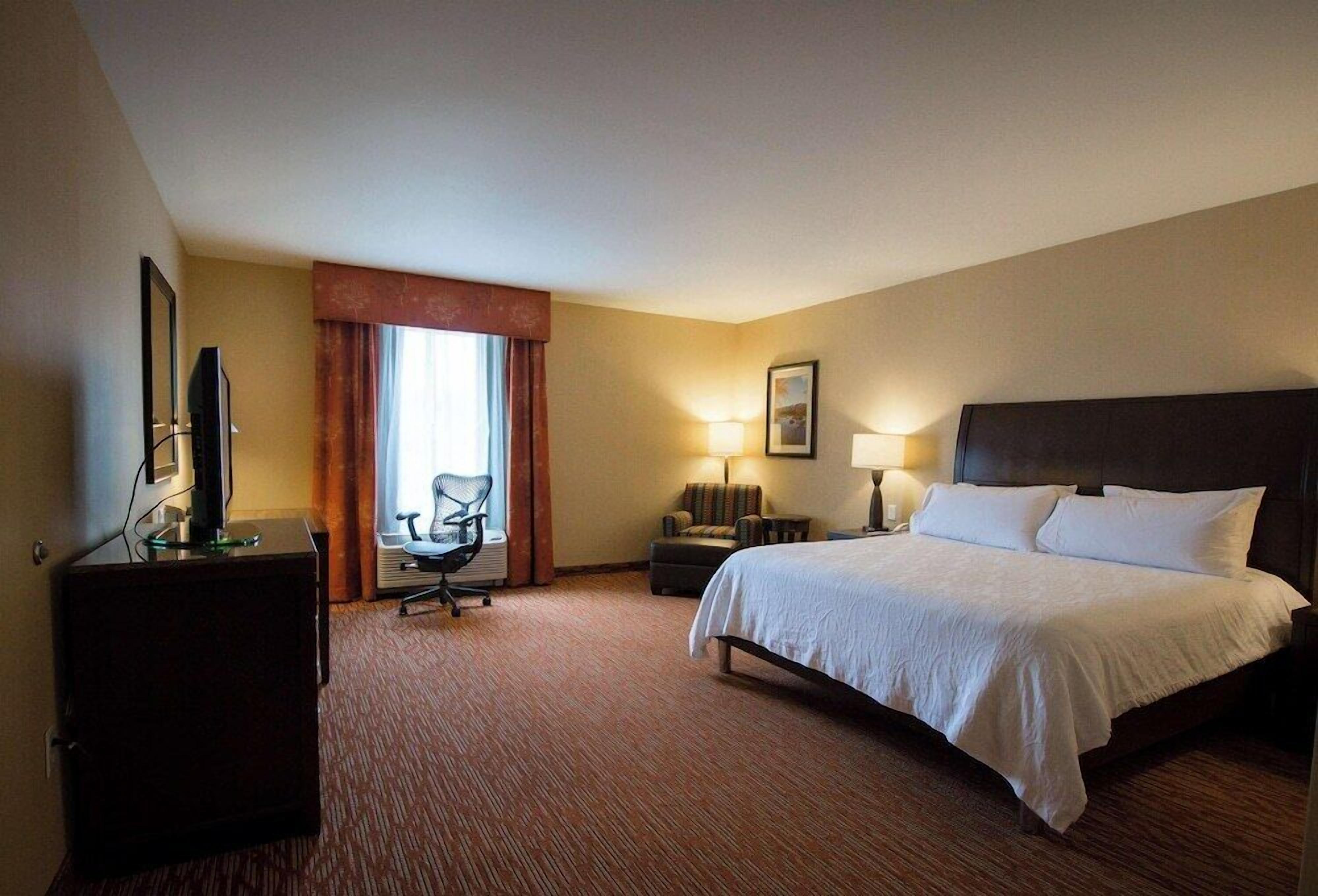 In-room safe, desk, iron/ironing board, free cribs/infant beds