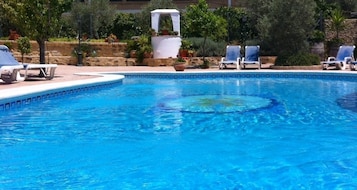 Outdoor pool, open 10:30 AM to 8:30 PM, pool umbrellas, sun loungers