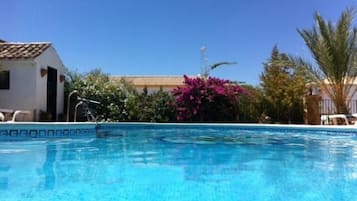 Outdoor pool, open 10:30 AM to 8:30 PM, pool umbrellas, sun loungers