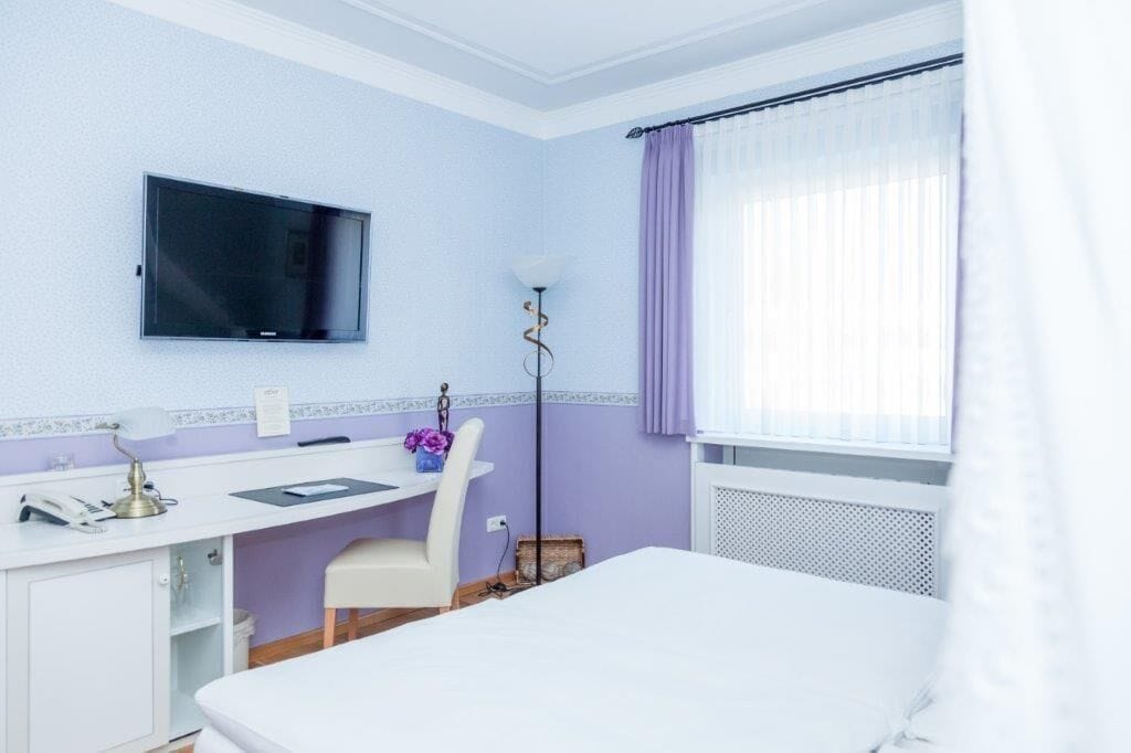 premium bedding, down duvets, memory-foam beds, minibar