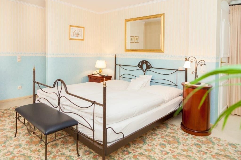 premium bedding, down duvets, memory-foam beds, minibar