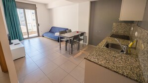 Condo, 1 Bedroom | Private kitchen | Full-sized fridge, oven, stovetop, cookware/dishes/utensils - Apartaments AR Niu D'or (Lloret de Mar)