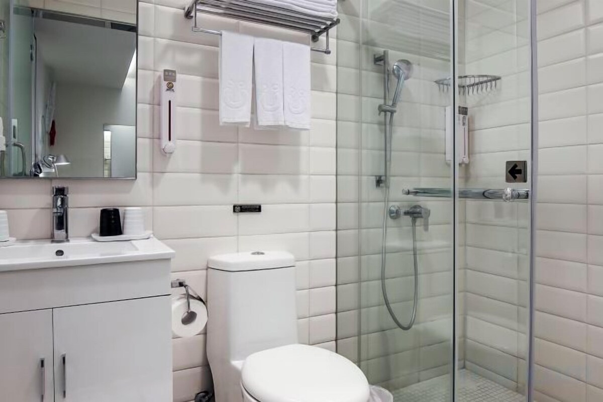 Bathroom | Free toiletries, hair dryer, slippers, electronic bidet