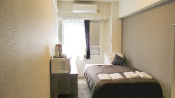 Desk, laptop workspace, free WiFi, bed sheets