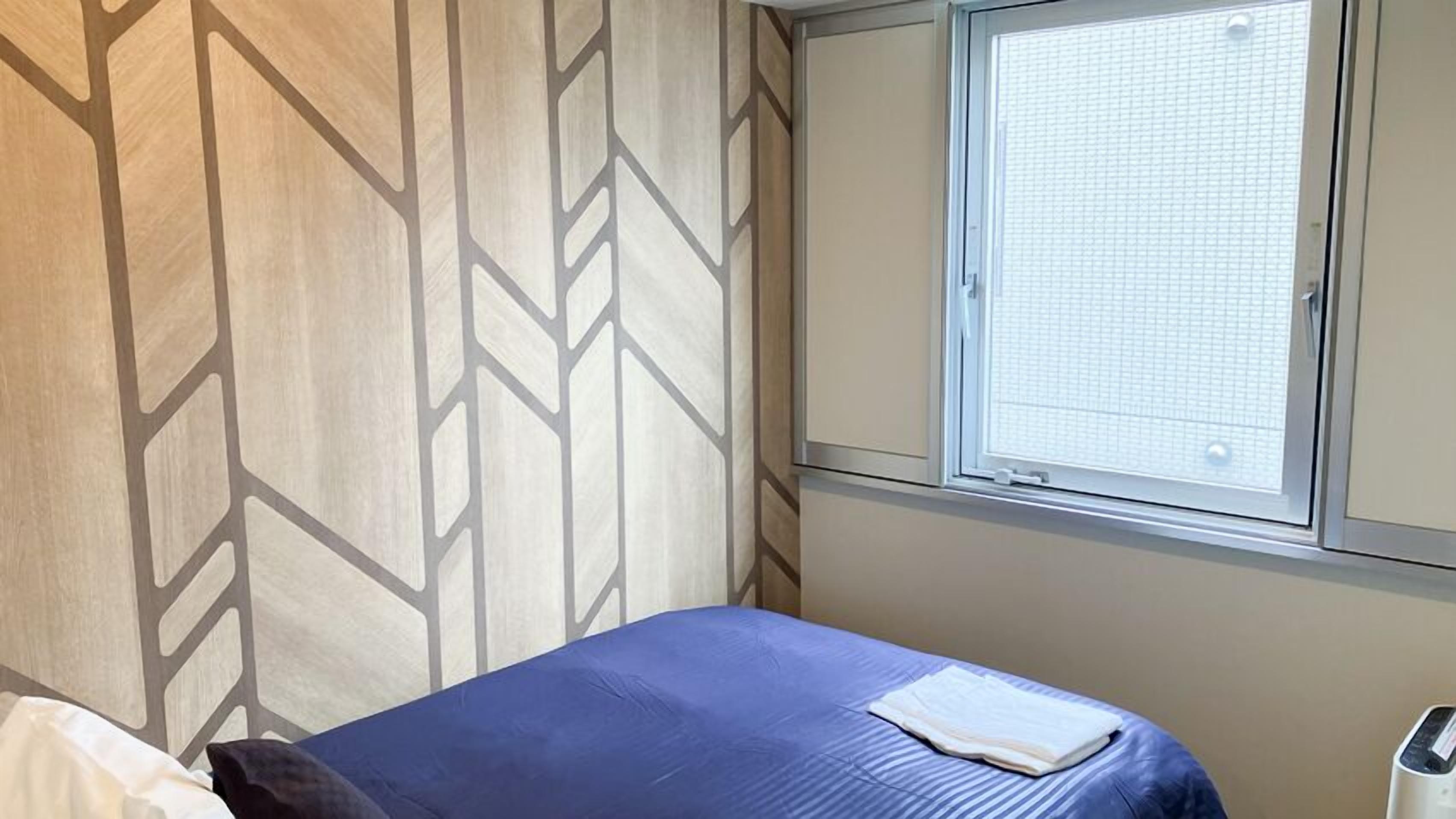 Individueel gedecoreerd, een bureau, gratis wifi, beddengoed