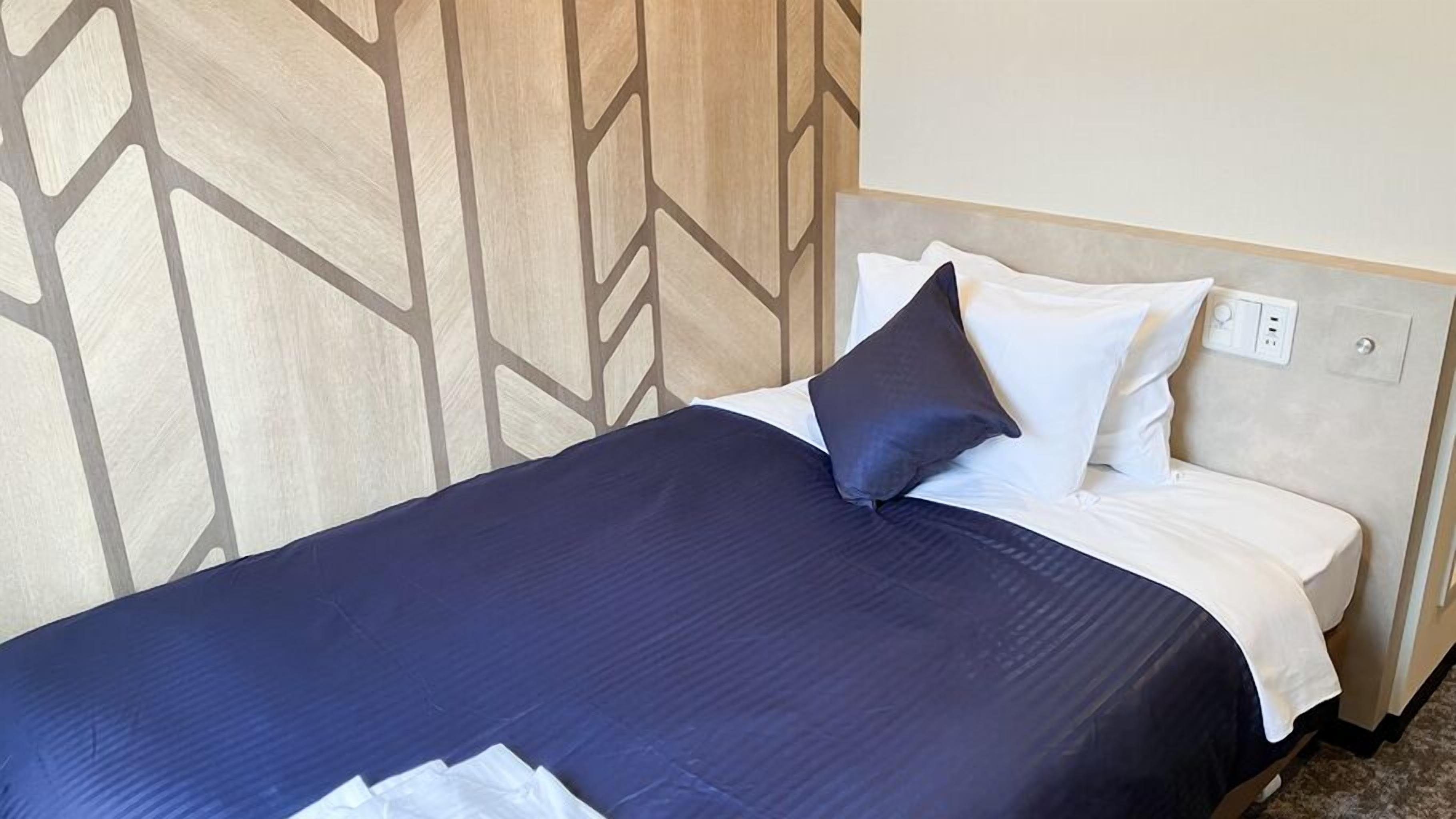 Individueel gedecoreerd, een bureau, gratis wifi, beddengoed
