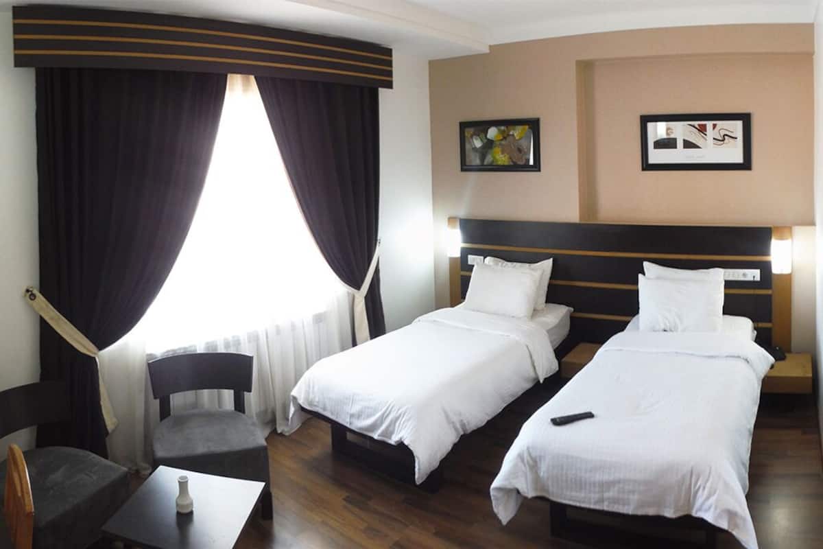 Ropa de cama de alta calidad y minibar