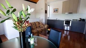 Executive Apartment, 1 Bedroom | Living area | 42-inch flat-screen TV with digital channels, LCD TV, DVD player